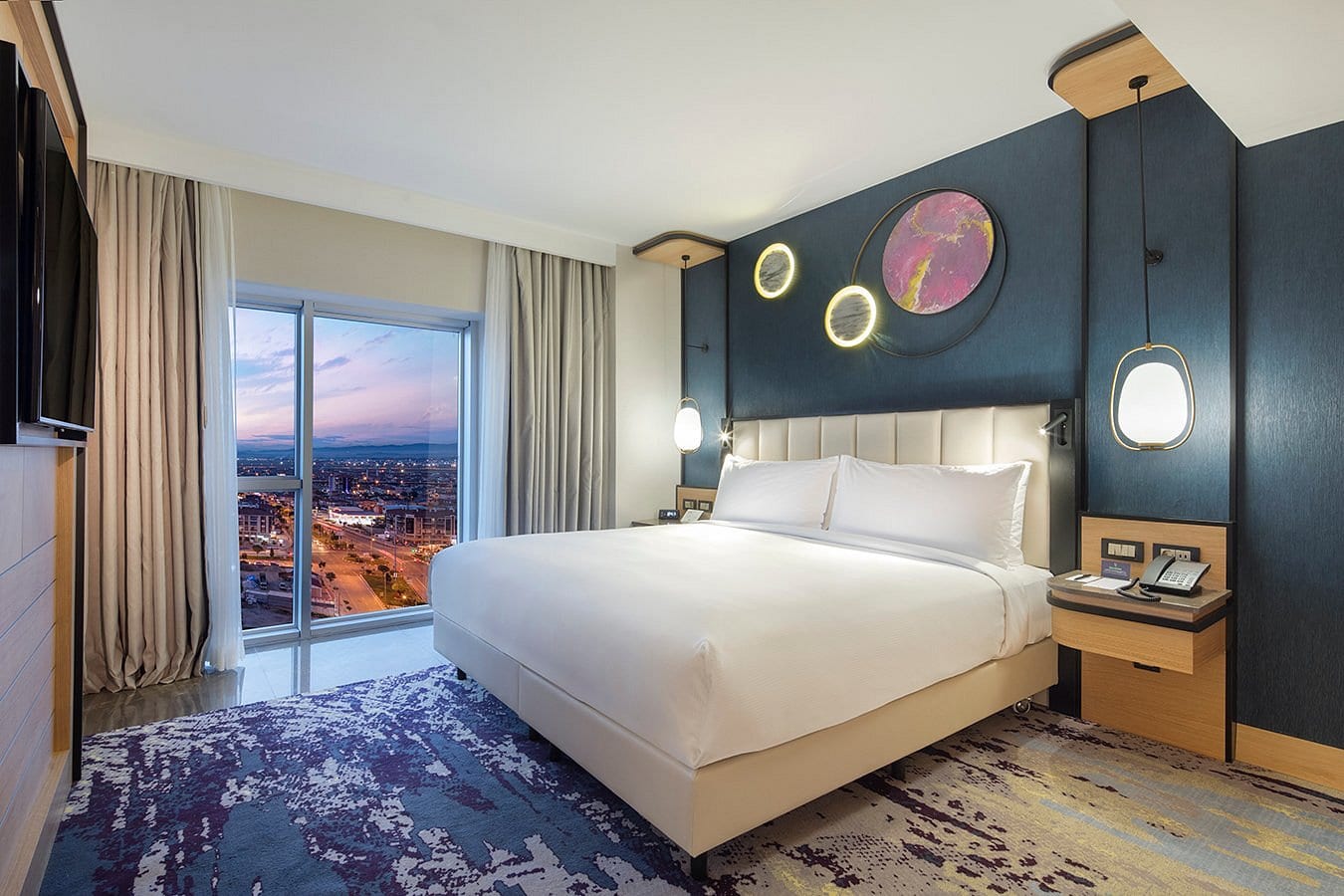 Afyon DTBH guest room bedside table and headboard lighting detail