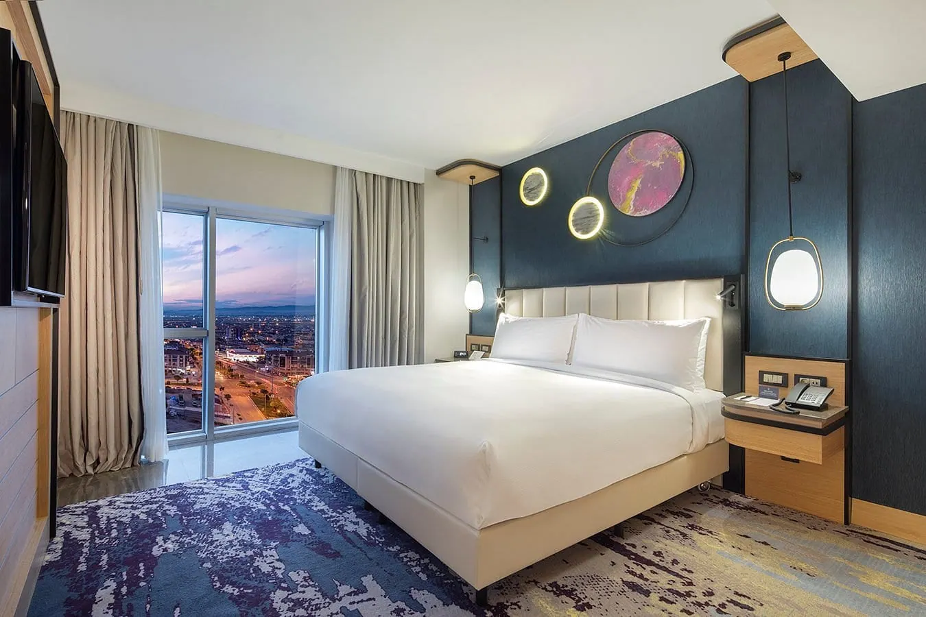 Afyon DTBH guest room bedside table and headboard lighting detail