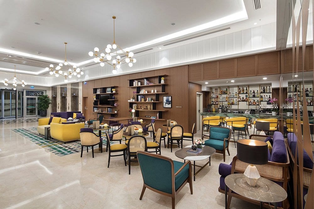 Afyon DTBH lobby bar with seating groups and pendant lighting