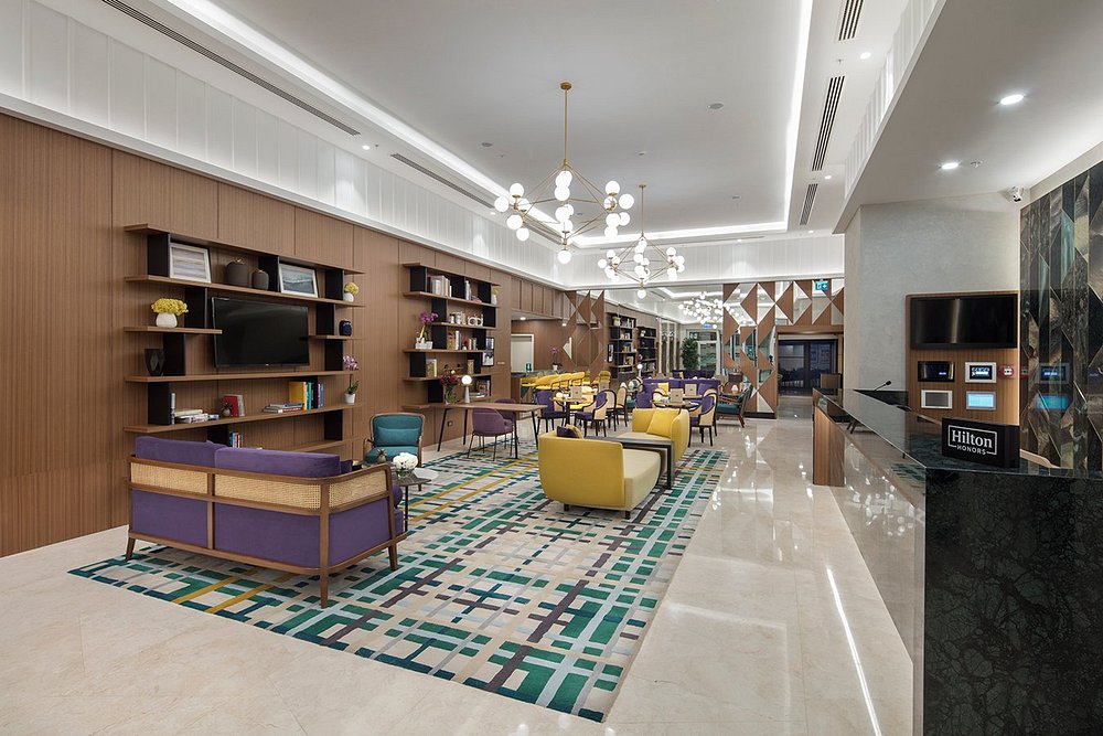 DoubleTree by Hilton Afyonkarahisar reception desk and stone-clad back wall